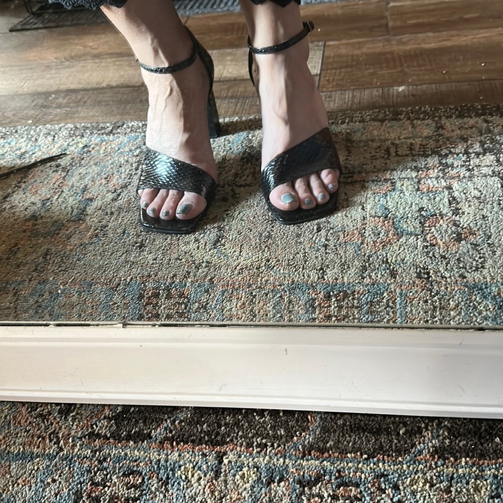 Alligator-like print on leather uppers. Lightly worn.